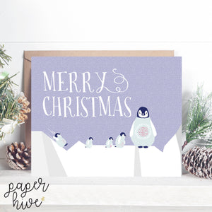 penguins playing in snow christmas cards